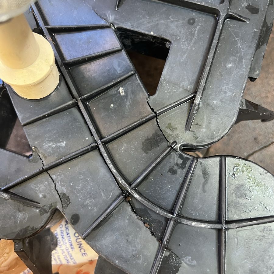 A cracked filter manifold found during teardown